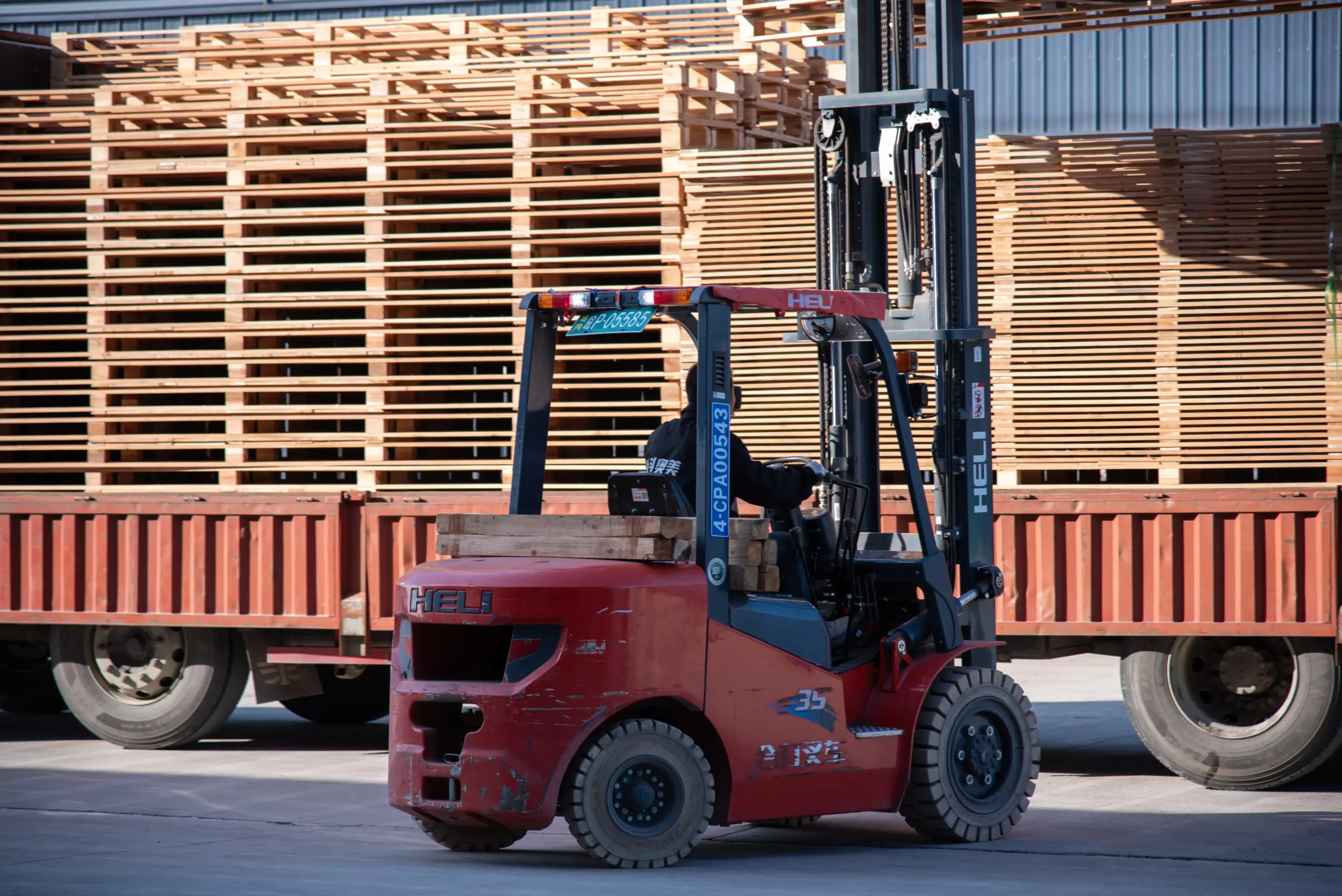 Forklift loading outdoor structure products for shipment