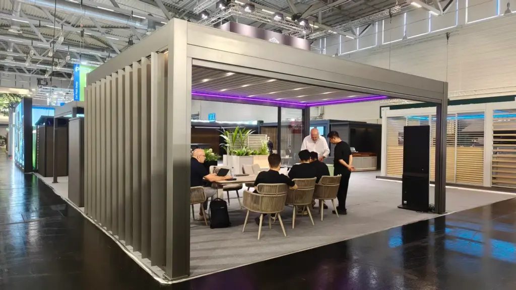 International buyers visiting Outdoor Creation pergola booth at spoga+gafa 2026