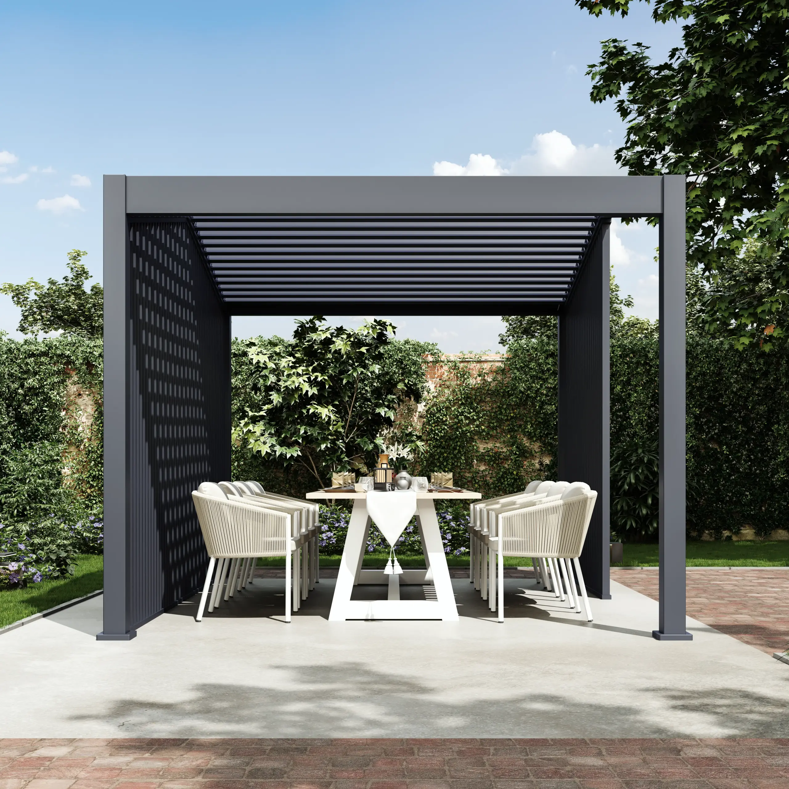 Front view of the APEX freestanding gabled aluminum pergola with an open dining area